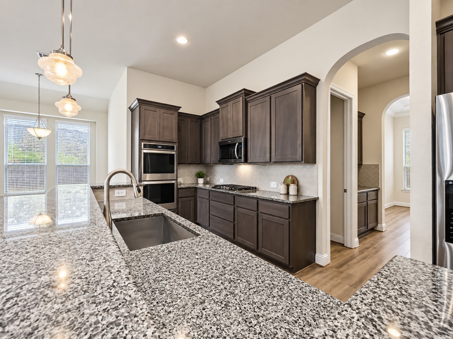 20306 Windsor Field Spring, TX 77379 - Photo 8 of 37 Lovely kitchen with stainless steel appliances, granite counter tops and double ovens