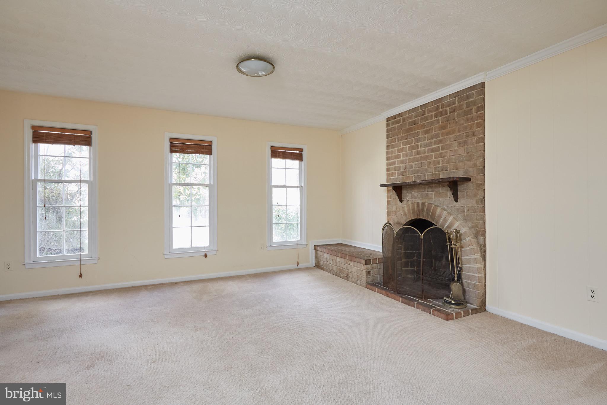 1534 Arbor View Road Silver Spring, MD 20902 - Photo 24 of 30 Family Room with Wood Burning Fireplace