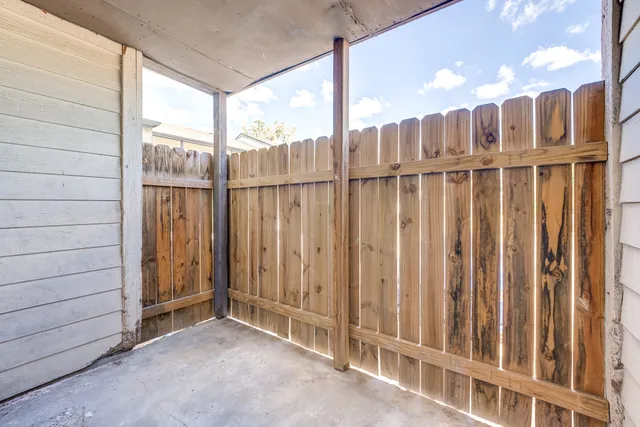 a view of a wooden fence