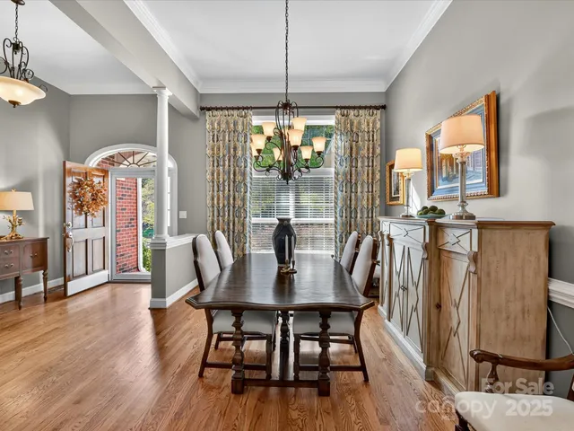 a dining room with furniture window wooden floor