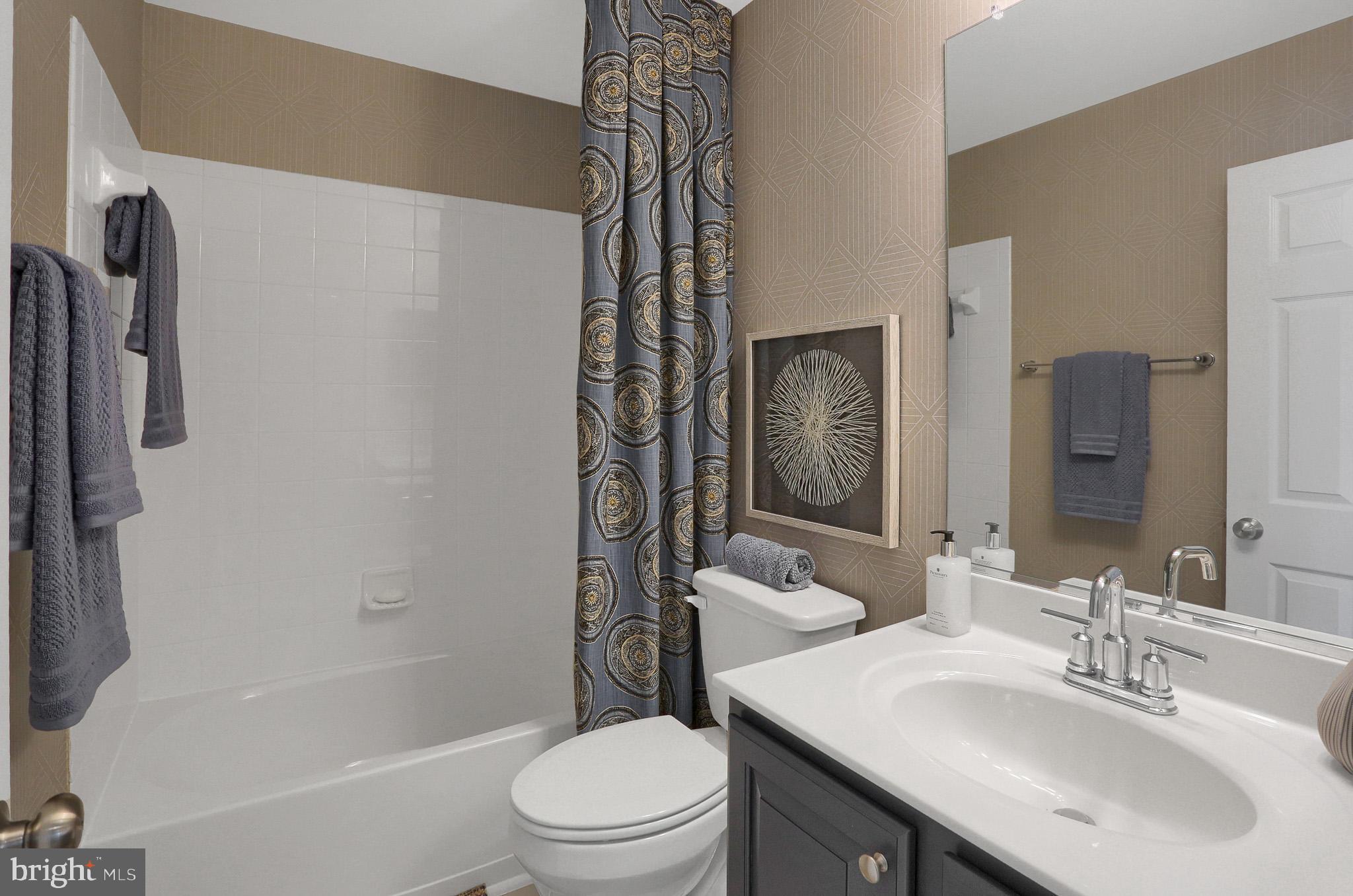 1205 Van Bibber Road Edgewood, MD 21040 - Photo 2 of 17 a bathroom with a sink toilet and shower