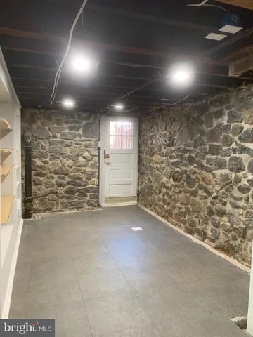 a view of empty room with windows