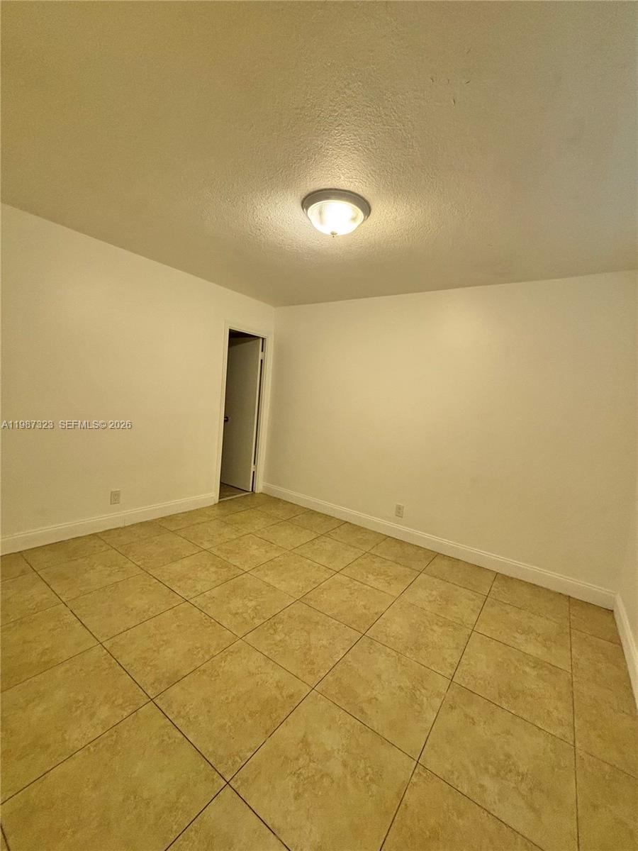 550 Southwest 2nd Avenue, Unit 1210 Boca Raton, FL 33432 - Photo 12 of 18 a view of an empty room