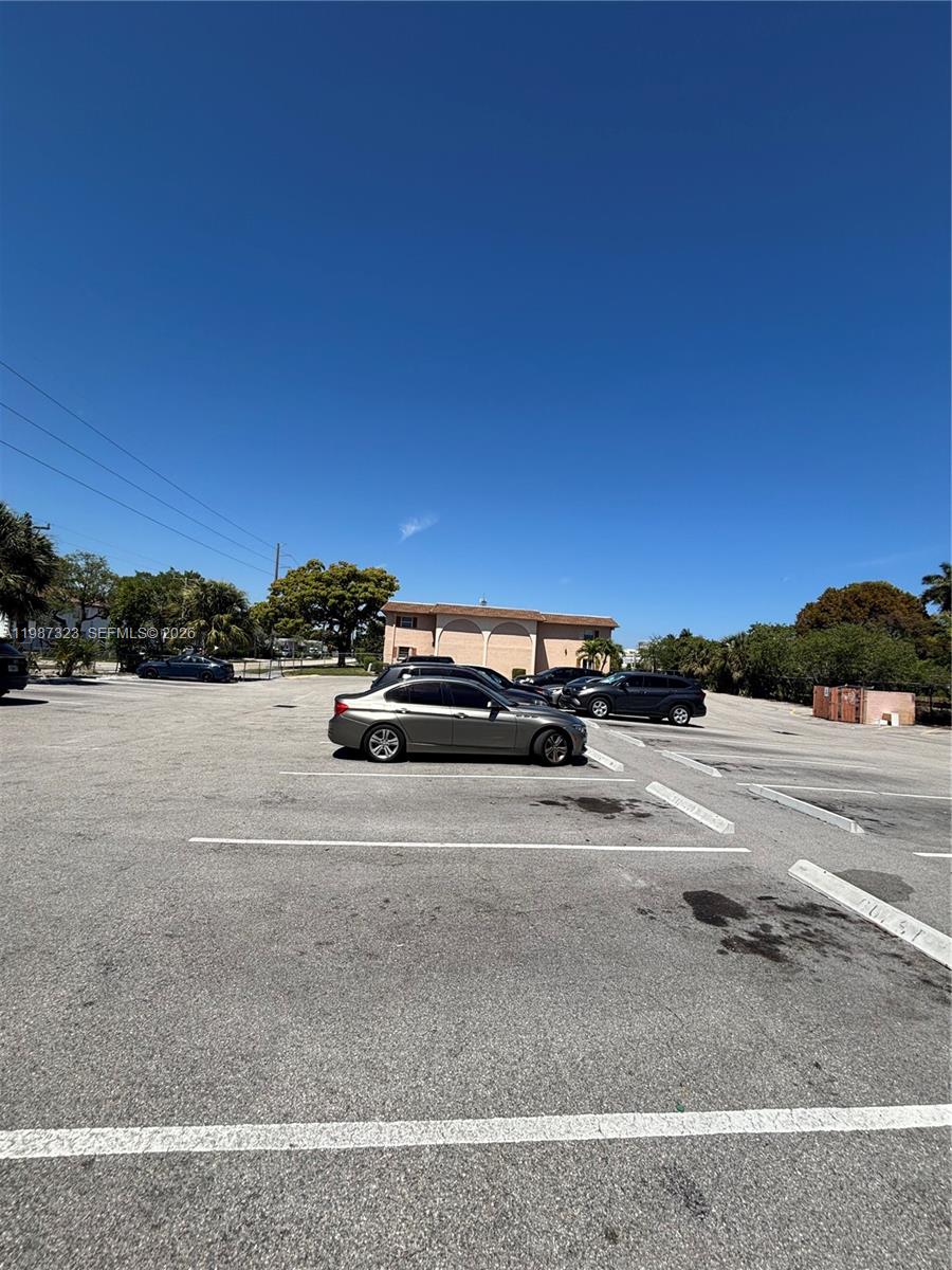 550 Southwest 2nd Avenue, Unit 1210 Boca Raton, FL 33432 - Photo 18 of 18 a view of street with parked cars