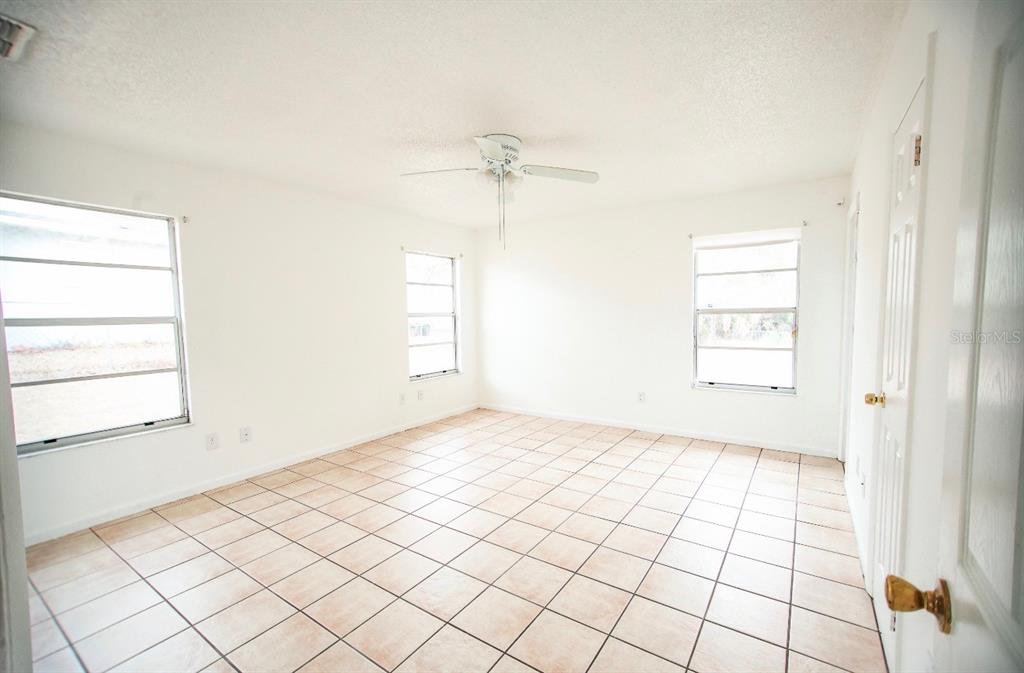 606 Water Road Ocala, FL 34472 - Photo 16 of 34 a view of an empty room and window