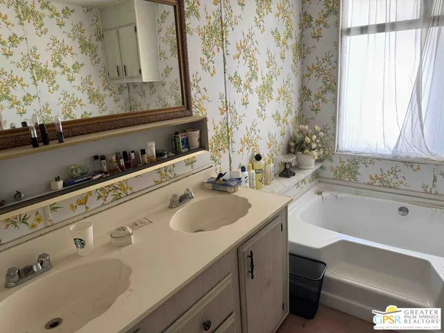 a bathroom with a sink and a bathtub