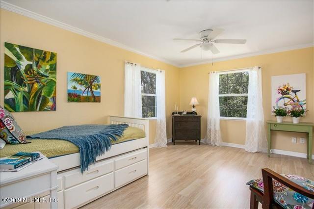 229 Dondanville Road St. Augustine, FL 32080 - Photo 12 of 22 a living room with a bed furniture and a window