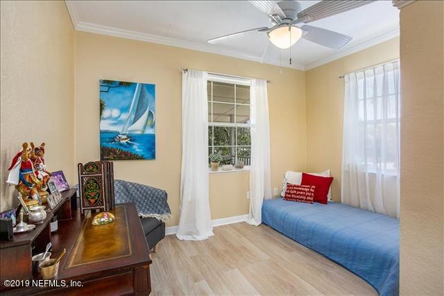 229 Dondanville Road St. Augustine, FL 32080 - Photo 13 of 22 a bedroom with bed and a window