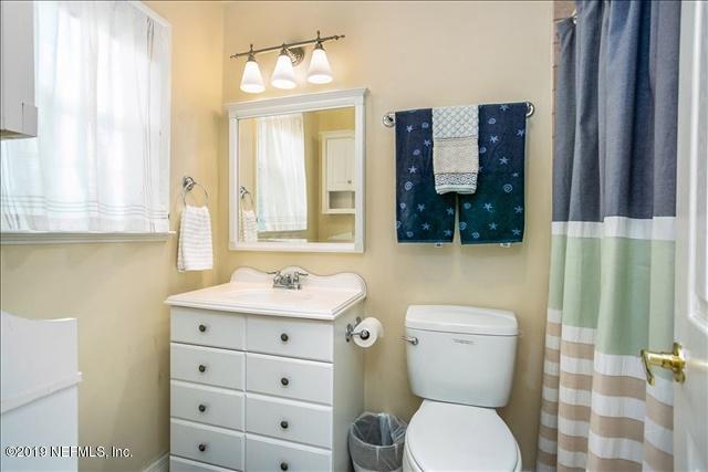 229 Dondanville Road St. Augustine, FL 32080 - Photo 16 of 22 a bathroom with a toilet a sink and a mirror