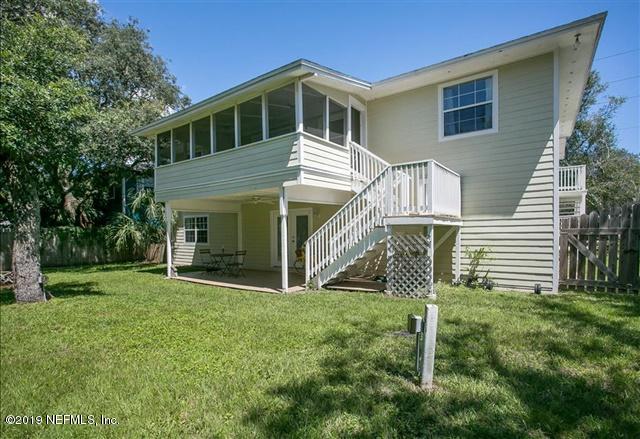 229 Dondanville Road St. Augustine, FL 32080 - Photo 20 of 22 a front view of a house with a yard