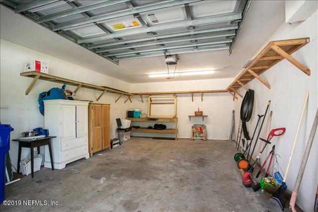 229 Dondanville Road St. Augustine, FL 32080 - Photo 22 of 22 a view of a garage with storage