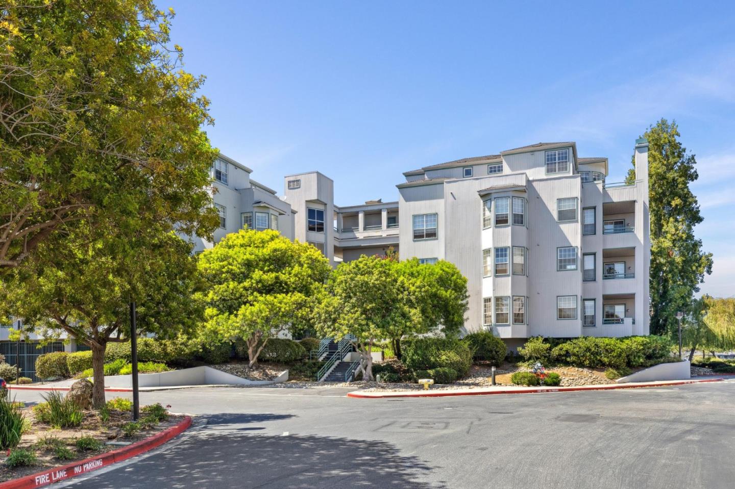 720 Promontory Point Lane, Unit 2305 Foster City, CA 94404 - Photo 16 of 78 a front view of a building with street view