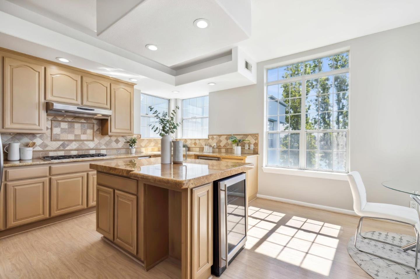 720 Promontory Point Lane, Unit 2305 Foster City, CA 94404 - Photo 44 of 78 a kitchen with a sink stove and cabinets