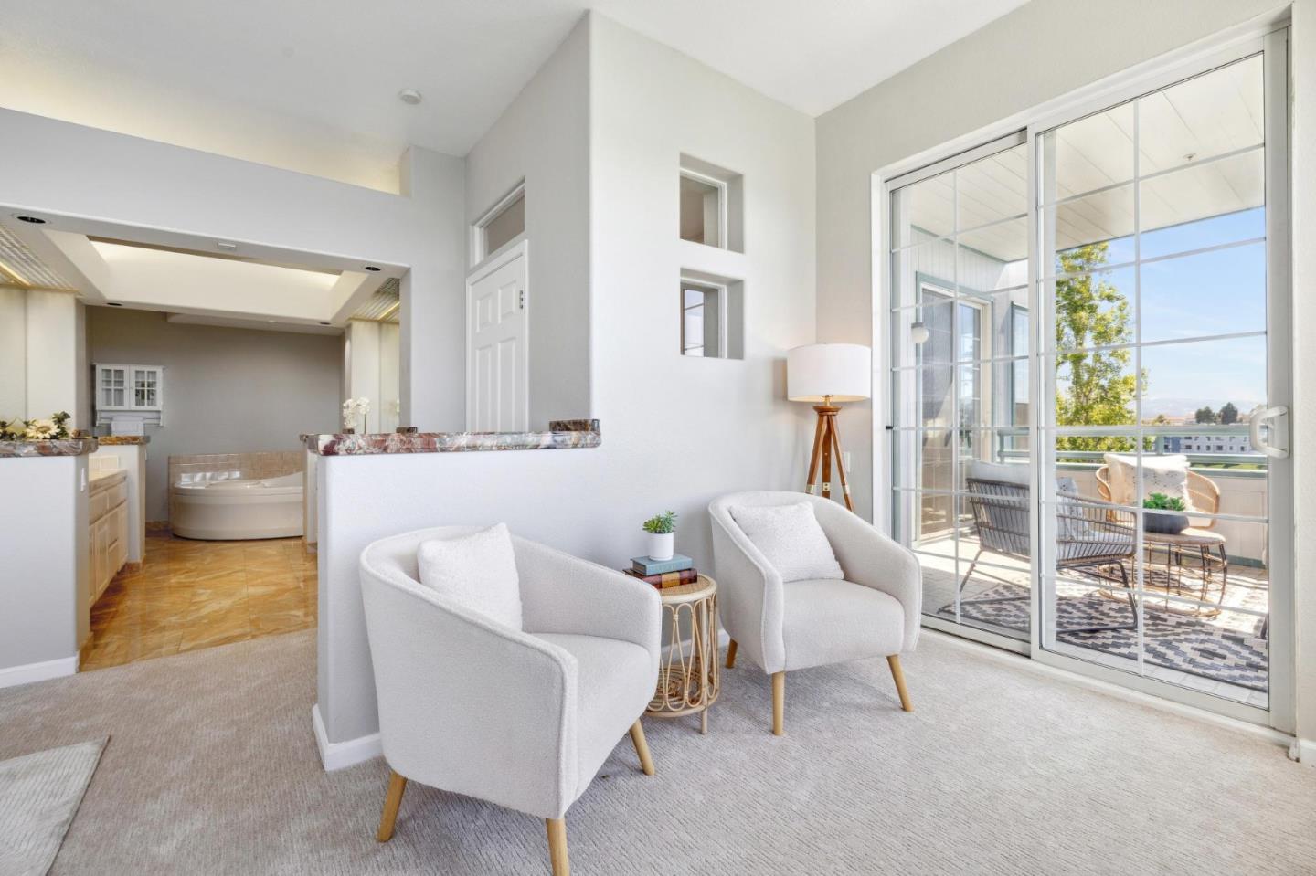 720 Promontory Point Lane, Unit 2305 Foster City, CA 94404 - Photo 52 of 78 a living room with furniture and a table