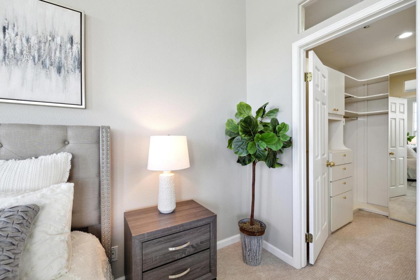 720 Promontory Point Lane, Unit 2305 Foster City, CA 94404 - Photo 56 of 78 a living room with furniture and a potted plant