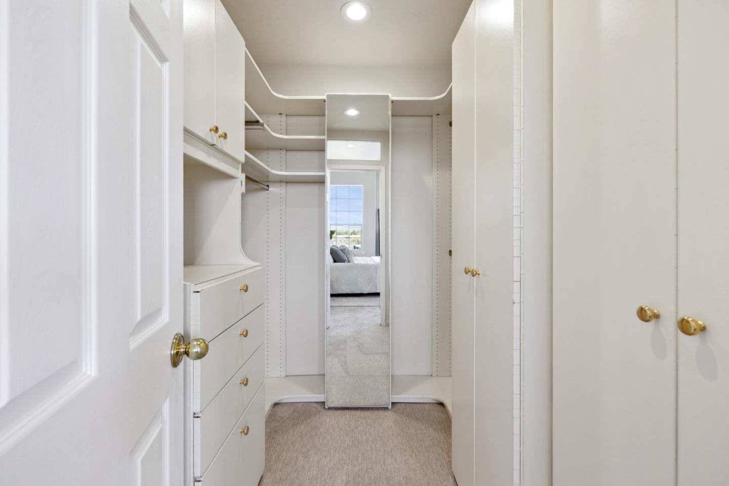 720 Promontory Point Lane, Unit 2305 Foster City, CA 94404 - Photo 57 of 78 a bathroom with a shower and a glass door