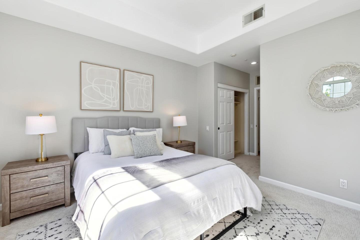 720 Promontory Point Lane, Unit 2305 Foster City, CA 94404 - Photo 67 of 78 a bedroom with a bed and a lamp