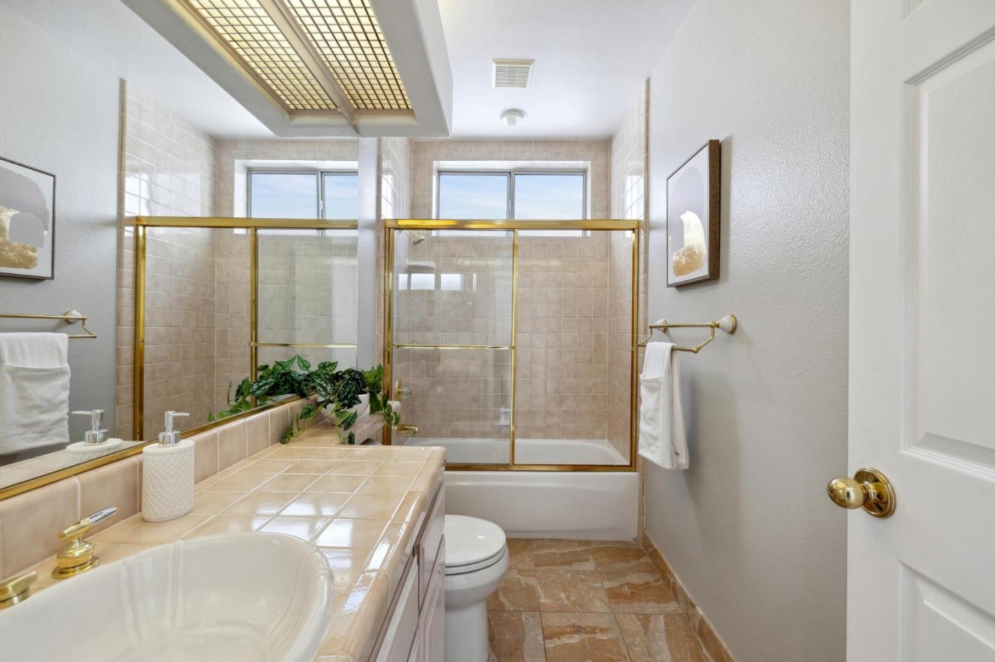 720 Promontory Point Lane, Unit 2305 Foster City, CA 94404 - Photo 71 of 78 a bathroom with a tub shower and window