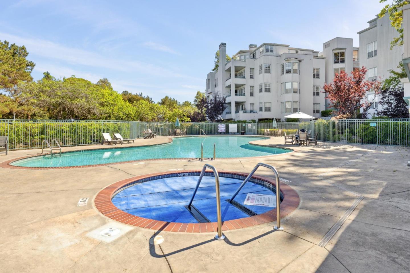 720 Promontory Point Lane, Unit 2305 Foster City, CA 94404 - Photo 76 of 78 a view of a swimming pool with a yard