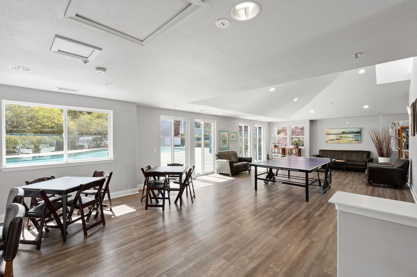 720 Promontory Point Lane, Unit 2305 Foster City, CA 94404 - Photo 77 of 78 a view of a dining room with furniture and wooden floor