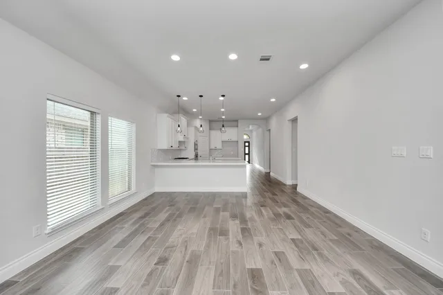 an empty room with windows