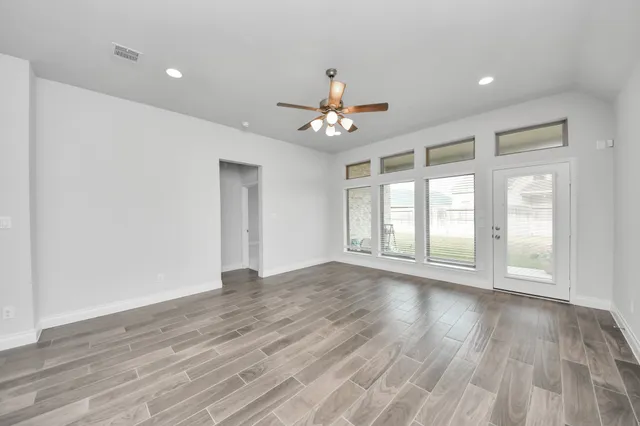 a bathroom with a double vanity sink a vanity and a mirror