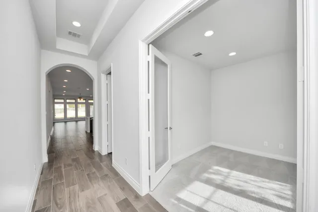 a view of a room that has a window in it