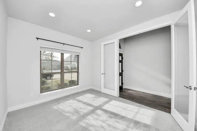 a kitchen with a stove a sink and a refrigerator