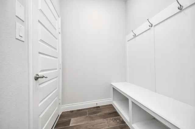 a kitchen with stainless steel appliances a stove a refrigerator and cabinets