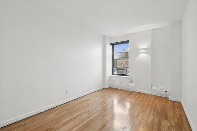 a kitchen that has a sink and a stove