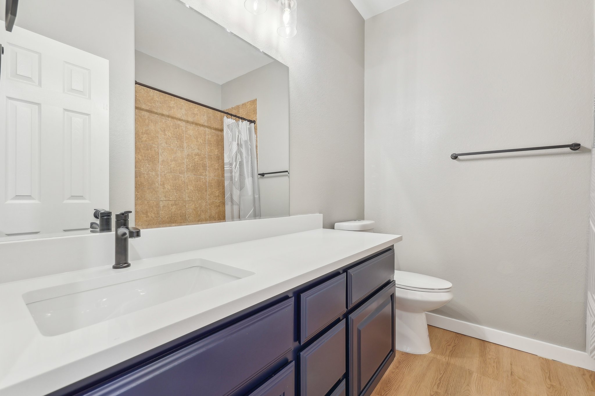 7324 Moon Rock Road Austin, TX 78739 - Photo 23 of 30 a bathroom with a sink and a toilet