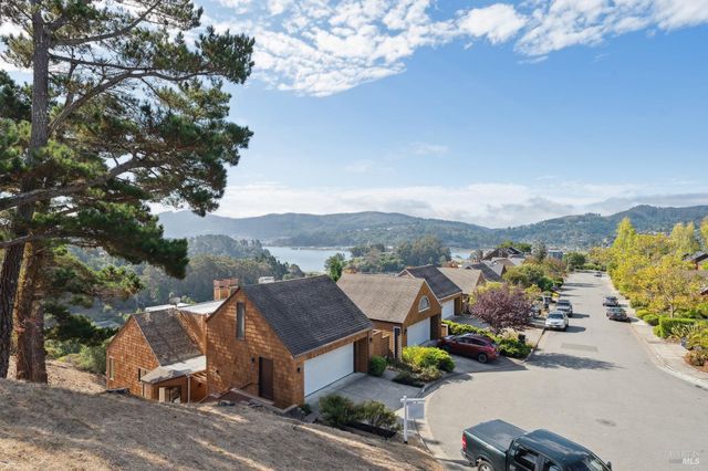 an aerial view of a house with a garden