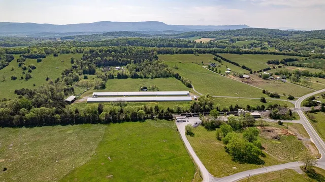 an aerial view of residential houses and outdoor space