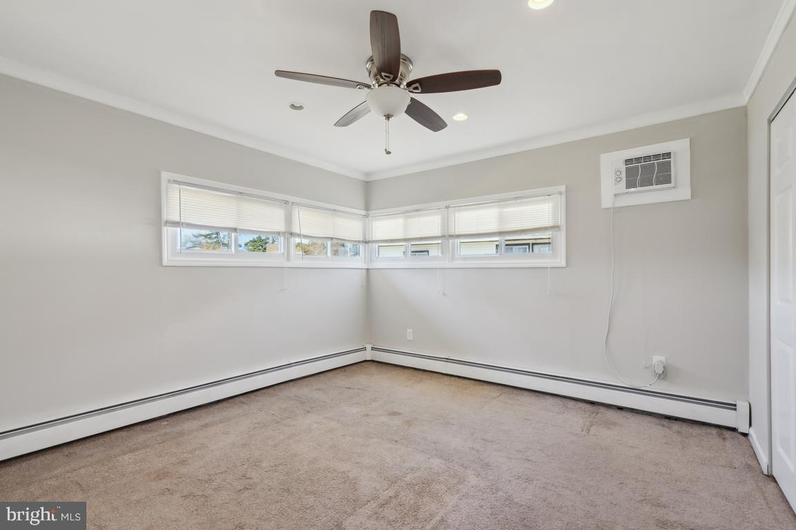 65 Gentle Road Levittown, PA 19057 - Photo 16 of 27 a view of a room with window and a ceiling fan