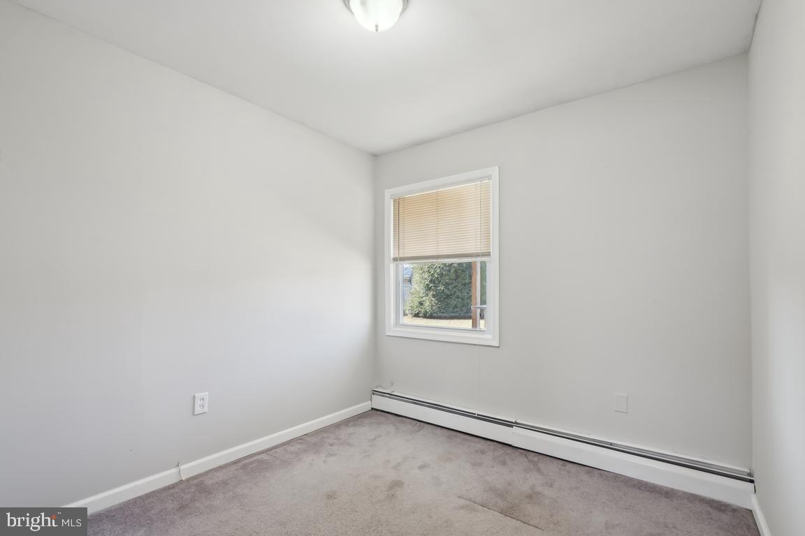 65 Gentle Road Levittown, PA 19057 - Photo 23 of 27 an empty room with a window