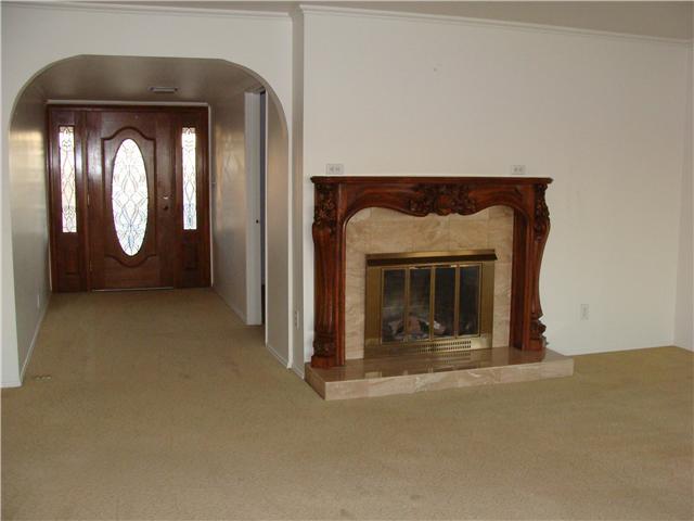 543 Rimrock Road El Cajon, CA 92020 - Photo 6 of 13 Entry way into the house view from living room. The fireplace is gas.