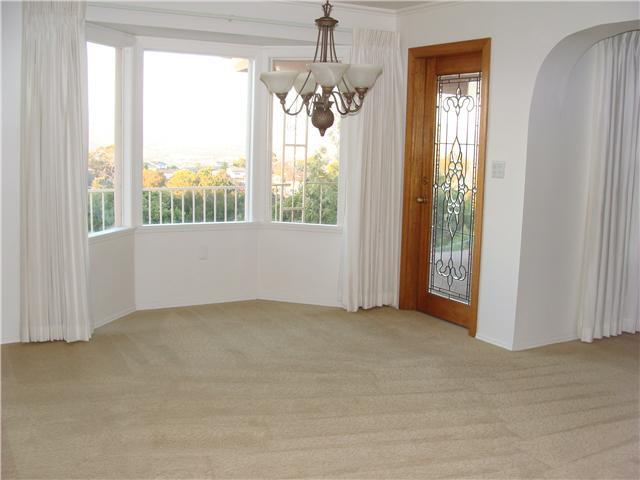 543 Rimrock Road El Cajon, CA 92020 - Photo 8 of 13 Formal Dining Room with beautiful glass door leading outside to the patio deck. Check out those views!