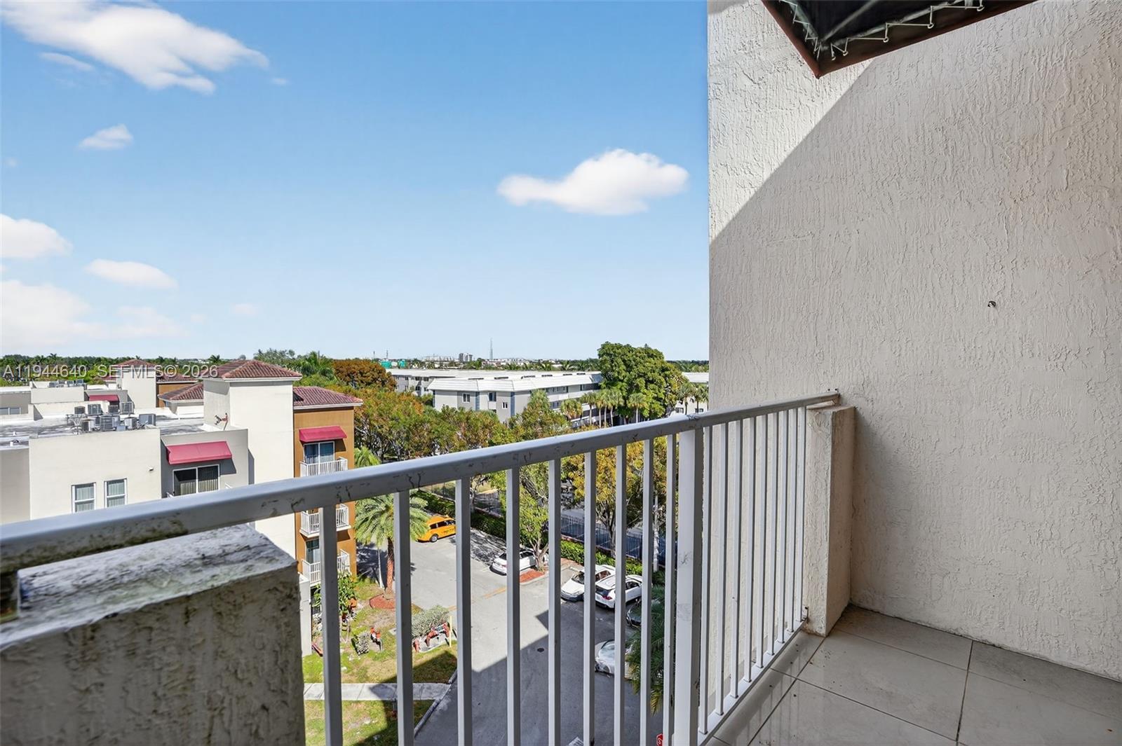 11060 Southwest 196th Street, Unit 605 Cutler Bay, FL 33157 - Photo 24 of 26 a view of a balcony and city view