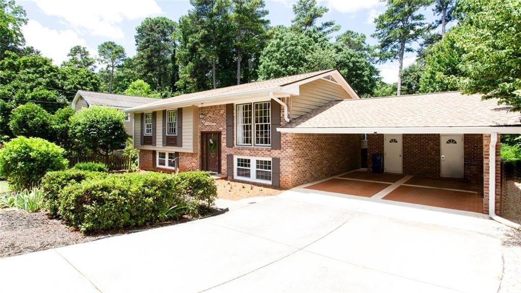 2814 Goodfellows Road Tucker, GA 30084 - Photo 8 of 46 a front view of a house with yard