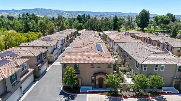 a aerial view of a house with a garden