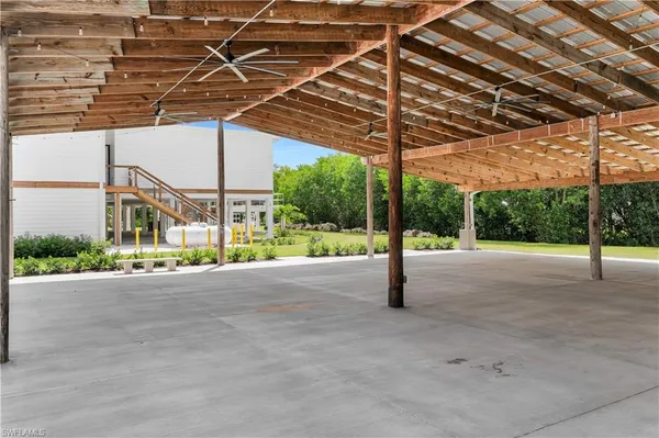a room with furniture and flat screen tv