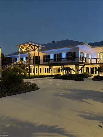 a front view of building with sign board