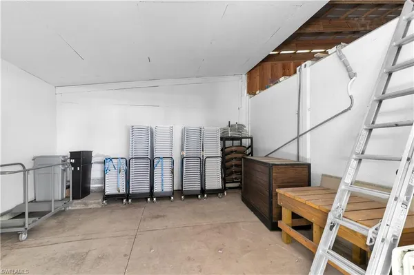 a kitchen with a refrigerator and countertop