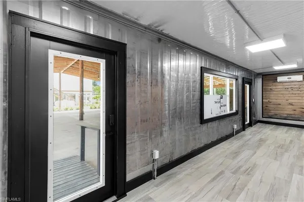 a kitchen with stainless steel appliances granite countertop a sink and a stove