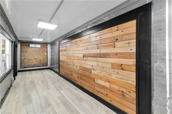 a bathroom with a double vanity sink and mirror