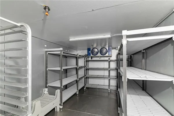 a view of a swimming pool with a yard