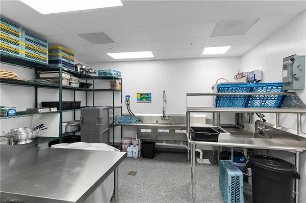 an aerial view of a house with a yard swimming pool outdoor seating and yard