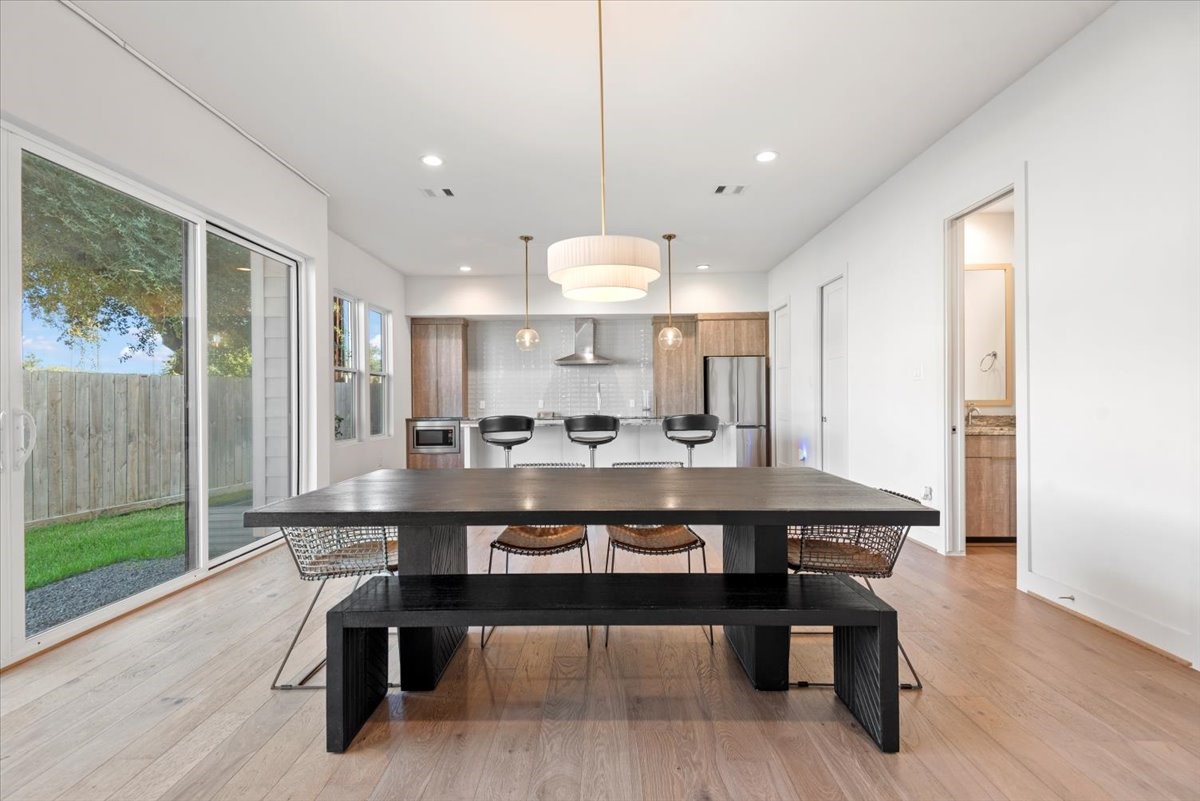 5203 Texas Street Houston, TX 77011 - Photo 3 of 20 We love the large sliding doors which provide a seamless indoor / outdoor experience.