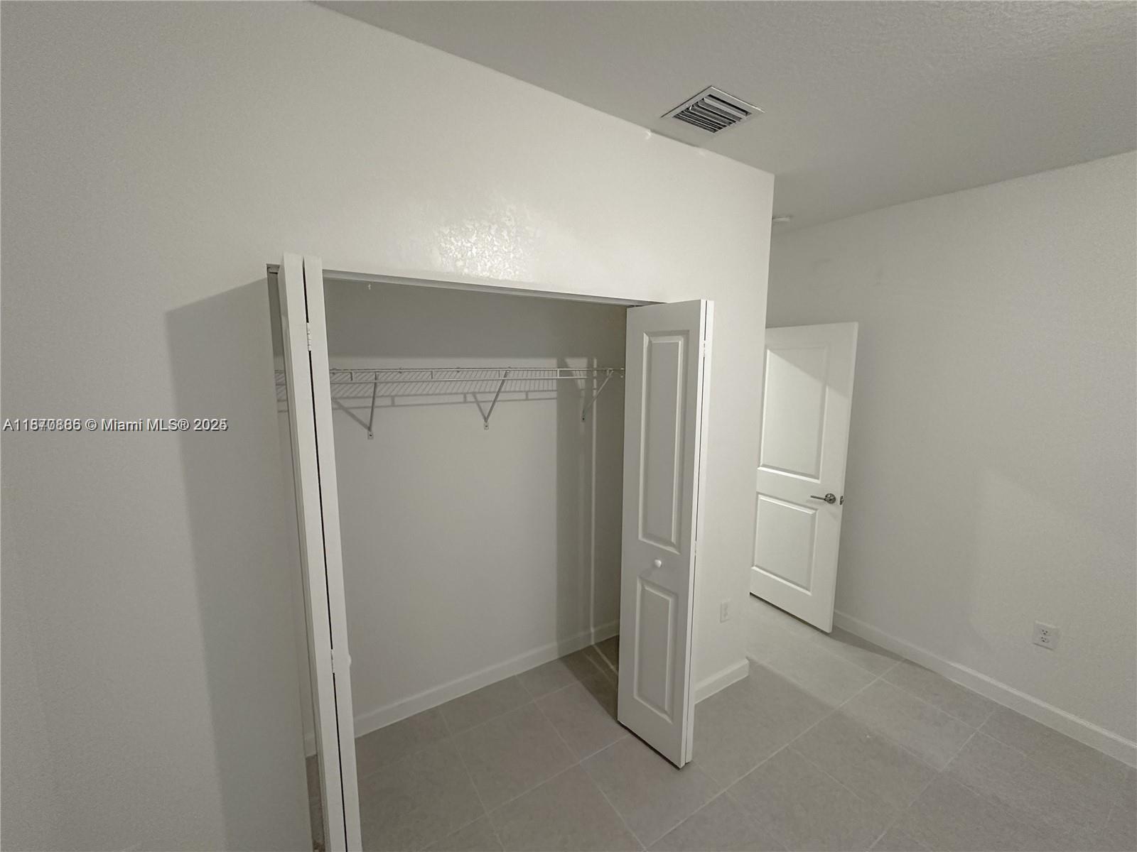 14804 Southwest 162nd Street Miami, FL 33177 - Photo 6 of 6 a view of an empty room