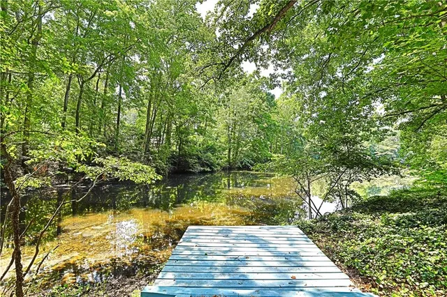 a view of swimming pool from a yard